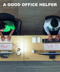 Top view of two people working at desks with computers, using Compact Glass Dry Erase Whiteboard With Built In Keyboard Stand And Drawer.