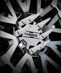 Close-up of Slick Chrome Wheel Lock Nut Kit featuring M12x1.5 threads on a wheel rim for secure anti-theft.