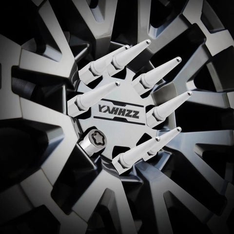 Close-up of Slick Chrome Wheel Lock Nut Kit featuring M12x1.5 threads on a wheel rim for secure anti-theft.