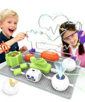 Kids using Hands On Electronics Exploration Kit For Kids With Over 300 Projects And 16 Circuit Parts Including Infrared Sensor Gyroscope Hand Crank Generator And RGB Light Modules A Premium Awesome STEM Toy Gift For Boys And Girls Ages 5 To 12 on a table