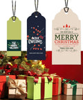 3 In 1 Gift Tag Punch Set with 1.5 inch, 2 inch, and 2.5 inch round hole punches, decorative Christmas tags displayed on gifts.