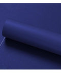 Self Adhesive Leather Repair Patch Tape For Car Seats And Couches Quick Fix For Couch Upholstery Solid Grip Waterproof And Scratch Resistant PU Leather Tape In Royal Blue, showing rolled royal blue PU leather material.