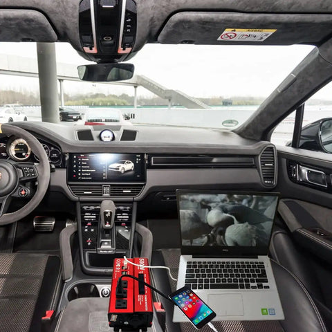 500W Continuous Power Inverter For Vehicles From 12V To 110V AC With 3 AC Outlets And 4 USB Ports in car with laptop
