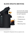 Vertuo Plus Deluxe Coffee And Espresso Maker By De'Longhi In Matte Black showing side view with capsule and brewed coffee