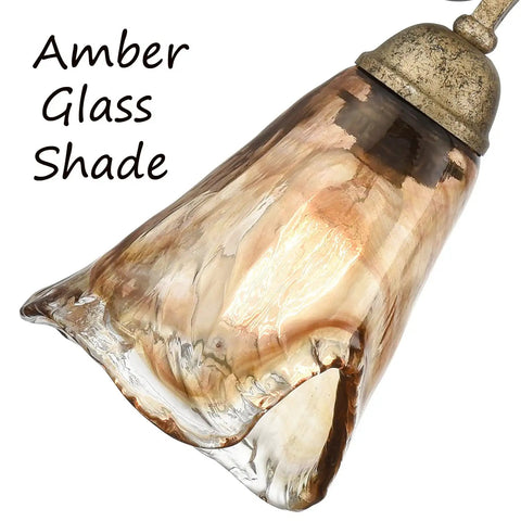 Close-up of handmade amber glass shade for Vintage Vanity Light Fixture Rustic Bathroom Wall Sconce Three Light.