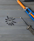 Kickstart Your Electronics Project With This M3 Hex Nylon Standoff And Screw Kit Featuring Black Plastic Insulators For Safe Motherboard Mounting And Effortless Assembly On Any Build. M3 nylon standoffs and screws laid out with tools on gray wood