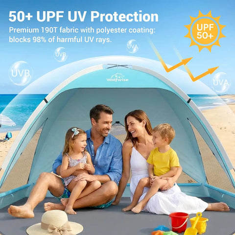 Family inside Large Beach Tent Sun Shelter For Three To Four People With UPF 50 Plus UV Protection Privacy Door on a sunny beach