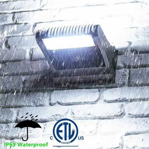 Rotatable 150W LED Wall Pack Light With Dusk To Dawn Photocell, 21000LM, mounted on brick wall in rain