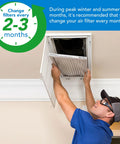 Man installing 10x20x1 Air Filter MERV 8 Pleated 6 Pack For Furnace And AC Returns Easy Install Captures Dust Pet Hair Pollen