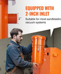 Person fitting Beast 1.6 HP Dust Collector With Media Reclaimer, 1.8 Gallon Capacity to sandblaster cabinet, highlighting 2-inch inlet.