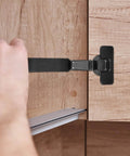 Concealed Cabinet Door Hinge With Soft Close Damper installed on kitchen cupboard, showing large bend design and mounting hardware.