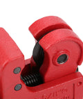 Close-up of red Compact Tube Cutter With Ball Bearing Roller 3 to 16mm Capacity, showing detailed cutting mechanism.