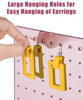 Rose Gold Mirror Finish Acrylic Earring Stand Three Pack Set with earrings for displaying at home or office