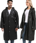 Two Pack Reusable Rain Ponchos For Adults With Hoods And Sleeves In Black being worn by a man and woman, lightweight and tear resistant.