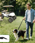 Universal Golf Cart Dog Leash And Pet Safety Harness With Quick Snap Backrest Clip for secure outings with dogs beside a golf cart.