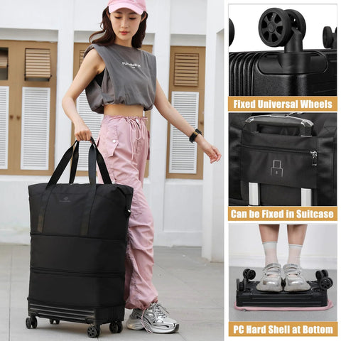 Front view of black fabric wheeled duffle bag with two carrying handles for travel.
