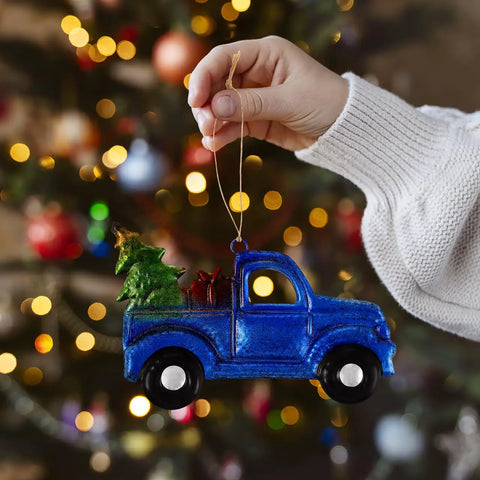 Hand holding Blue Vintage Iron Christmas Truck Ornament For Christmas Tree, Rustic Farmhouse Style Hangable Pendant Decor