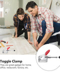 Two men assembling wood flooring using 4 Piece Quick Release Toggle Clamp Set With Push Pull Straight Line Action, shown in close-up.