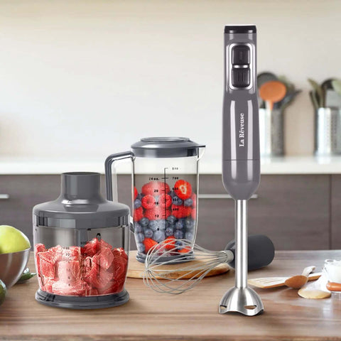 Heavy Duty Handheld Immersion Blender With 300 Watt Motor And Ultra Quiet Operation, including mixing base and measuring pitcher.