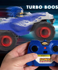 RC Sonic Racing CrossWorlds Monster Truck Ready To Run 2.4GHz Remote Control Toy in motion with turbo boost feature