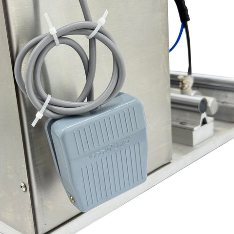 Hella Compatible 110V Semi Automatic Vacuum Capping Machine foot pedal control with coiled gray cable for easy operation.