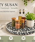 Game Changing 12.5 Inch Wooden Lazy Susan Turntable with a smooth swivel base and sharp black leaf design for kitchen organization.