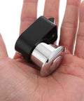 Hand holding Zinc Alloy RV Lock Push Button Latch for doors and cabinets with tool free installation and high security