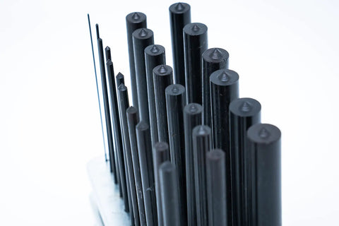 Heavy Duty 25 Piece Transfer Punch Set from 1mm to 13mm by 0.5mm increments, tool steel with black oxide finish, close-up view.
