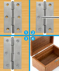 Top Tier 12 Pack Of 2.5 Inch Mini Butt Hinges In Classic Silver Finish Installed on a wooden box with screws.