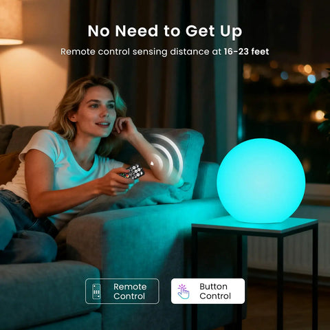 Woman using remote to control 12 Inch LED Dimmable Light Ball That Floats For Pool And Home Use With Remote 16 Color RGB Waterproof Night Light