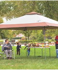 Family enjoying picnic under 13x13ft Instant Canopy Sun Shelter With UPF 50 Plus UVGuard in park setting