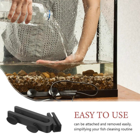 Person using Fish Tank Water Hose Clip Holder For Aquarium Hose Clamp Made Of ABS Plastic Sturdy And Wear Resistant For Easy Water Changes