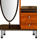 Close-up of a wooden furniture piece with two drawers and mirrors supported by adjustable rubber foot levelers with iron studs.