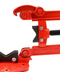 Close-up of Heavy Duty Pipe Vise With Beefy Forged Steel Yoke for Plumbing Tasks, showing rust-resistant red finish and adjustable jaw.