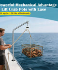 Rugged Pro Grade 800 Lb 304 Stainless Steel Crab Pot Puller Davit Rig With Ball Bearing Pulley Block lifting a crab pot on a boat.
