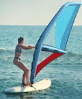 Person windsurfing with 4.2 square meter windsurf wing foil inflatable handheld wing for surfing, made of Oxford cloth and PVC.