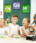 Children exploring Colorful Science Bulletin Board Set With Scientist Posters And Classroom Banner For Teachers in classroom