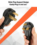 Hands holding a 4 Prong To 3 Prong Dryer Adapter 30 Amp NEMA 10-30P To 14-30R Converter With Ground Wire, plug detail.