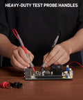 Person using 8-Piece Multimeter Test Leads Kit With Alligator Clips, Plunger Mini Hooks And Test Probes on motherboard.