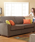 Person using 20 Piece Assorted Felt Furniture Sliders Set For Hard Surfaces to move a sofa on hardwood floor