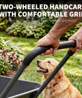 Heavy Duty Garden Wheelbarrow Cart With Dual Wheels And Built In Stand handle close-up with dog in garden setting