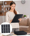 Woman holding 25 Pack Black Bubble Mailers Padded Envelopes Beefed Up Thickened Poly Bubble Packaging Bags Self Seal Adhesive