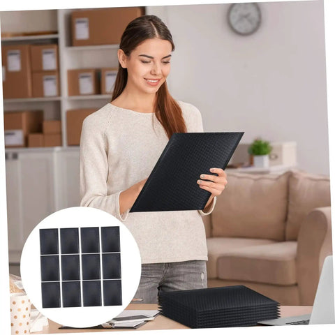 Woman holding 25 Pack Black Bubble Mailers Padded Envelopes Beefed Up Thickened Poly Bubble Packaging Bags Self Seal Adhesive