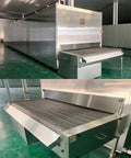 Top Shelf Industrial Tunnel Freezer With Sturdy Roller Conveyor Belt For Lightning Fast Individual Quick Freezing Of Prime Meat Seafood And Farm Fresh Veggies At Your Busy Food Shop showing stainless steel finish and conveyor ramp.