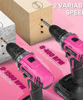 Pink 20V Cordless Drill Set With Drill Brush, Bit Kit, Three Eighths Inch Keyless Chuck, Dual Speed Control, shown in action
