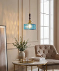 BBLLWJ 1-Pack Vintage Pendant Light for Kitchen Island, Brass & Wood Hanging Fixture with 78" Adjustable Cord, Blue Rectangular Hammered Glass Ceiling Light for Dining Room, Sink, Bedroom hanging over a table with decorative items.