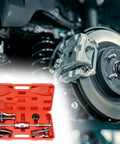 Front view of red case with QWORK 3-jaw puller set for automotive bearings and pulleys; brake rotor in background.