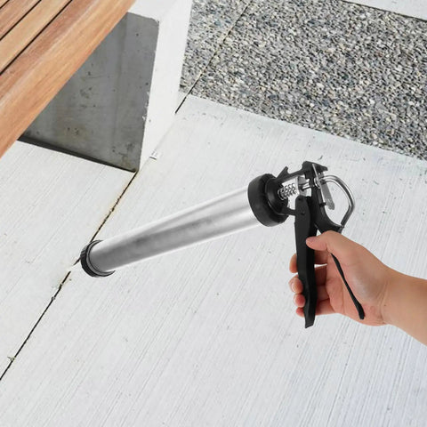 Top Tier Metal Caulk Gun With Thick Half Round Rod For Windows Doors And Bathroom Sealant Worry Free Application Adhesive Applicator in use