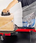 Electric Stretch Film Wrapping Machine Wrap Around Film Balers 15 7 Inch Turntable 30 Rpm High Speed Motor sealing a wooden box.