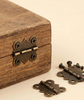 Antique Bronze Butterfly Hinges Set For DIY Crafts With 80 Screws shown with wooden box, mini metal hinges 25x20mm